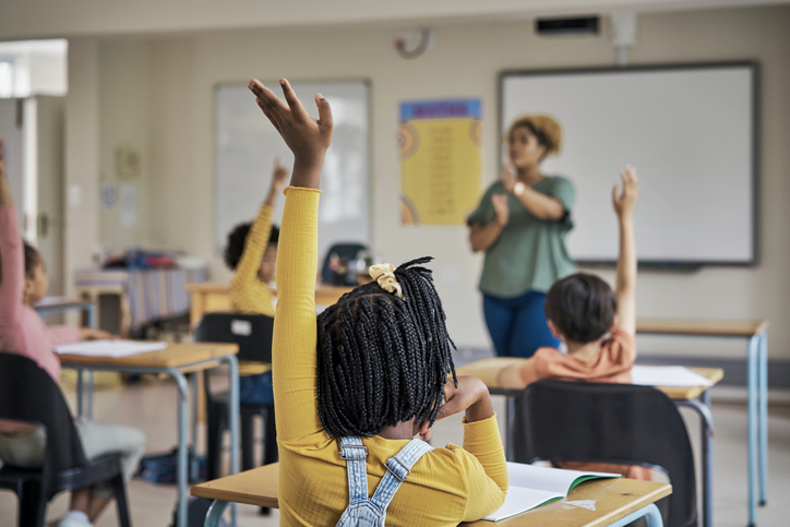 hands raised in class